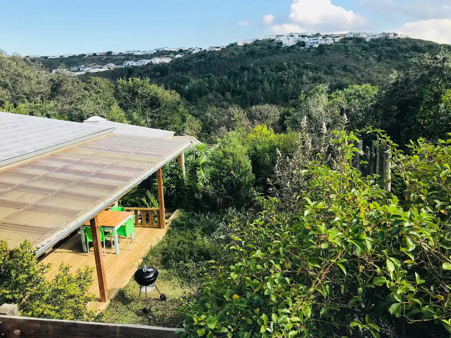 Treebia Self-catering apartments, a suburban forest hideaway set on the slopes overlooking the Klein Piesang River valley greenbelt area with abundant bird life and regular sighting of the famous Knysna Loerie and local Vervet monkeys.