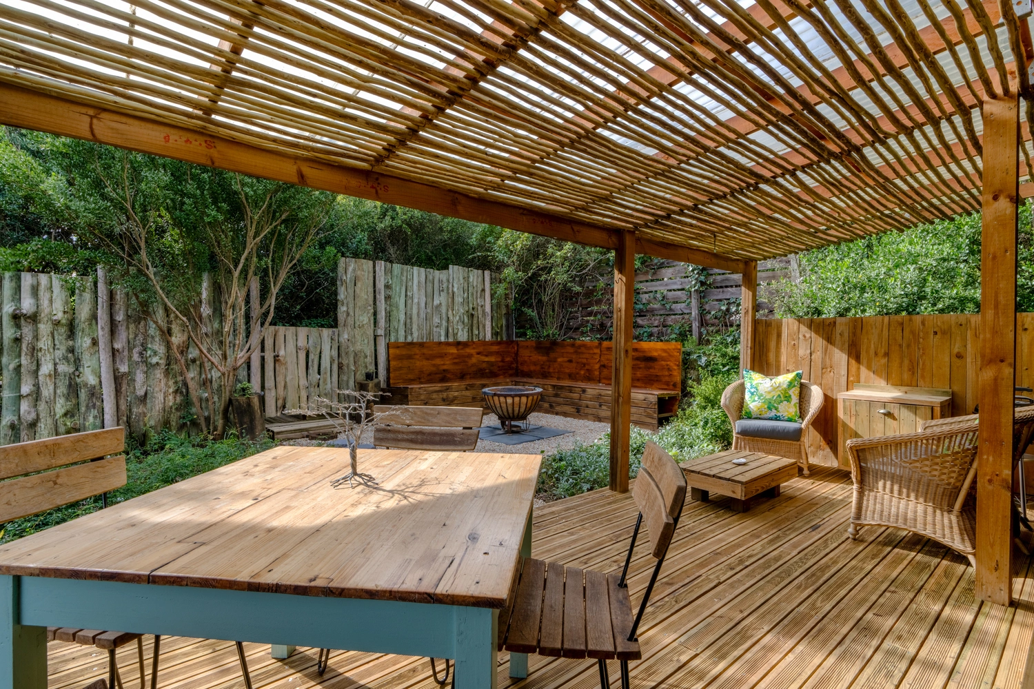 View of your private patio and garden. Equipped with a fire pit and a Weber BBQ