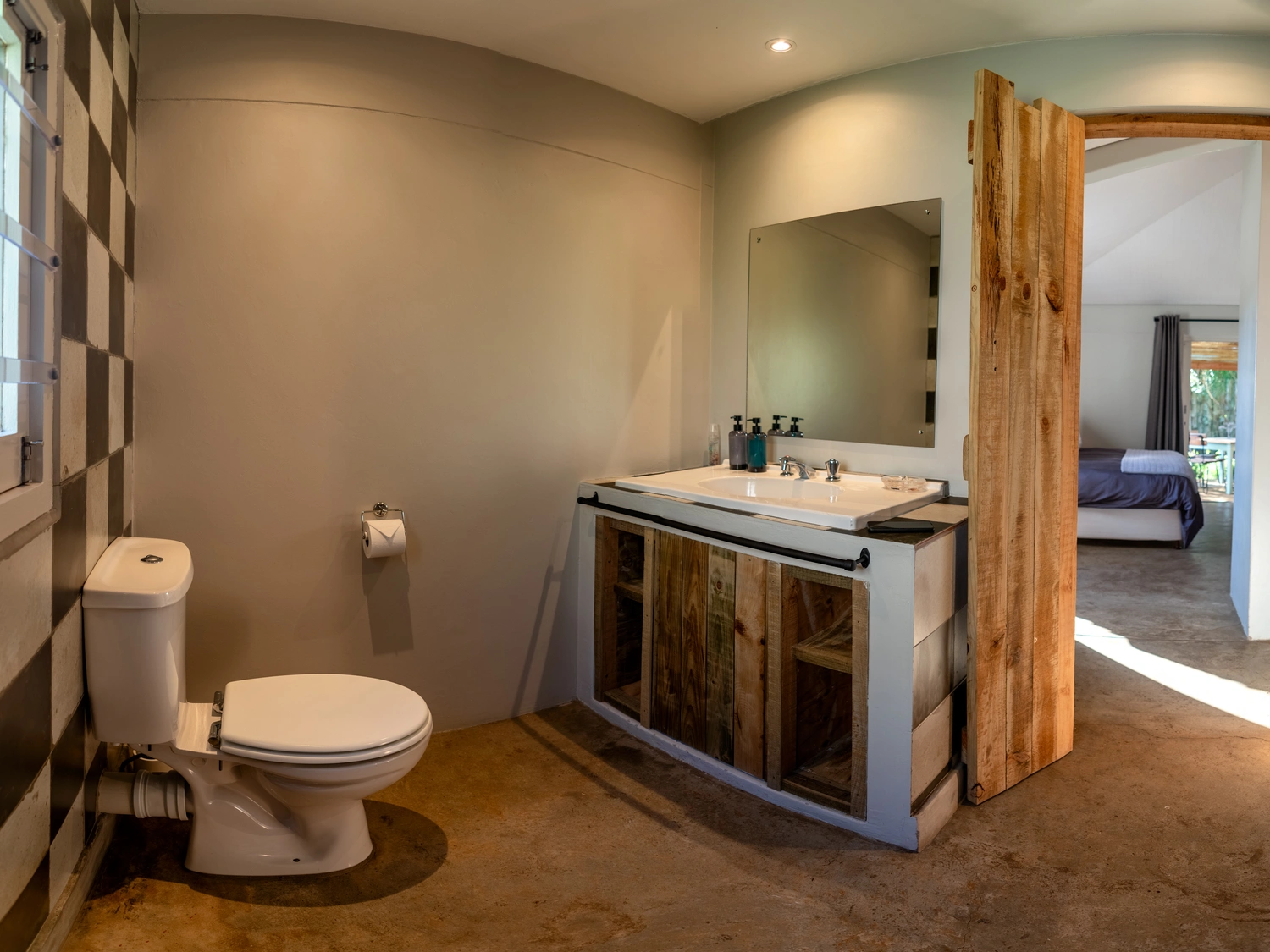 The en-suite bathroom is equipped with a shower