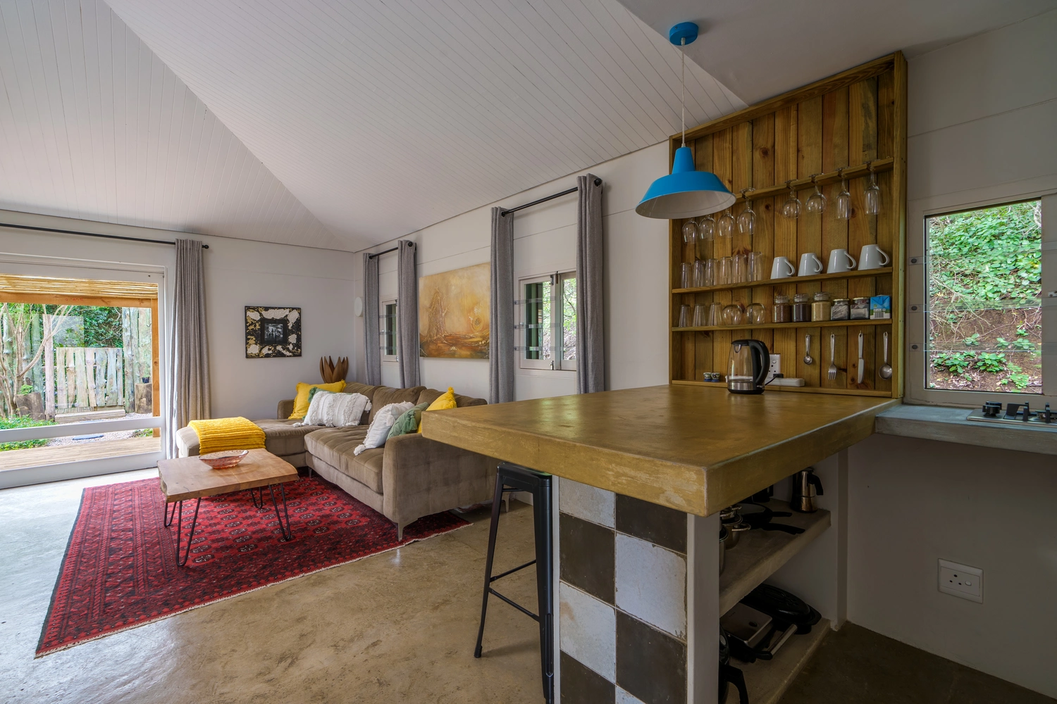 Open plan kitchen leading onto the lounge and private patio/garden